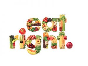 "Eat Healthy" spelled out in fruit and vegetables